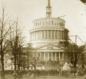 The unfinished Capitol dome formed the backdrop to Lincoln’s first inaugural in 1861. Library of Congress