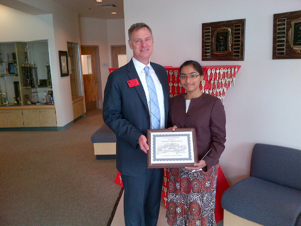 Congressman Peters and Vaishnavi Rao hold the award plaque presented to Canyon Crest Academy