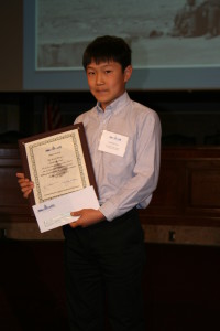 Andrew Tan with his award