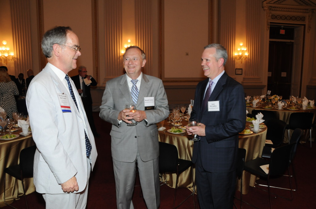 Representative Jim Cooper (D-TN), Donald Carlson (PricewaterhouseCoopers), and Scott McCandless (PricewaterhouseCoopers) share a laugh.