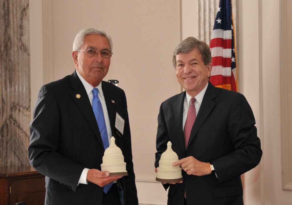 The Honorable Ron Sarasin presents Senator Blunt with marble bookends of the Capitol dome.