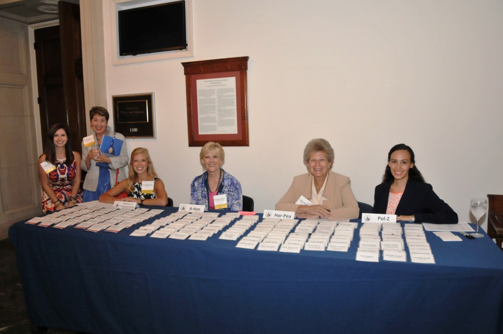 USCHS staff and volunteers ready to hand out name badges.