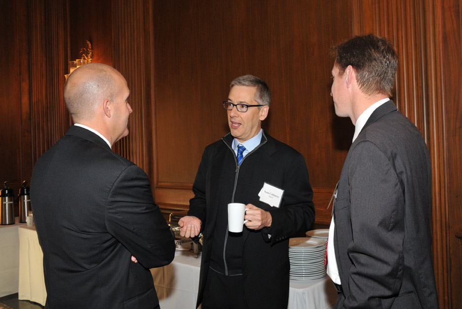 Sean Callinicos (Sanofi) chats with Jonny McPherson and Loren Driscoll (both with Boehringer Ingelheim).