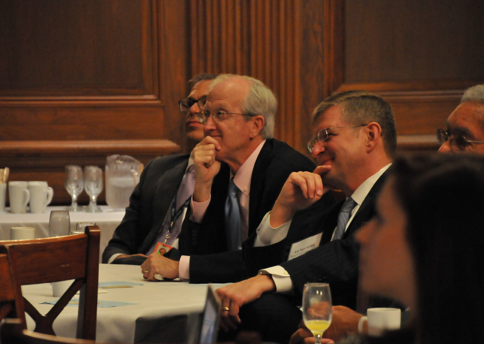 Charlie Ing (Toyota Motors North America) and Ed McClellan (PricewaterhouseCoopers) smile in response to Gahan’s remarks.