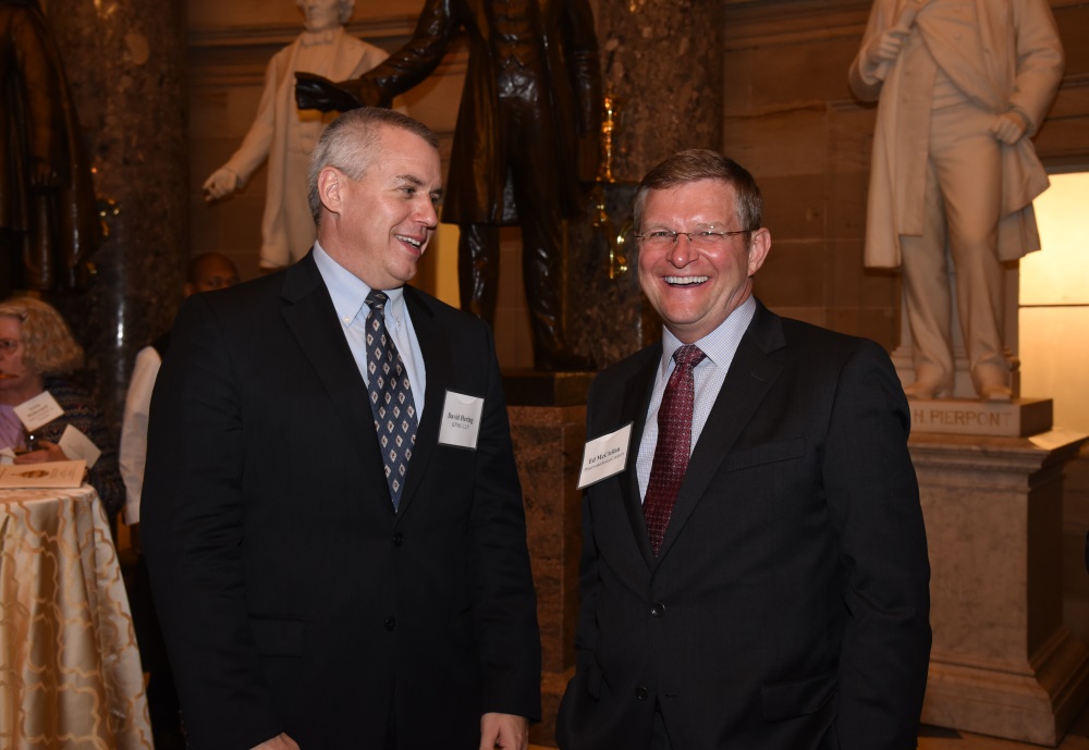 David Hering (KPMG LLP) and Ed McClellan (PricewaterhouseCoopers) enjoy a laugh.