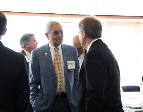 USCHS President Ron Sarasin greets Rich Merski (Cigna).