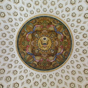A mural and coffers in the ceiling of the Northeast Pavilion of the Jefferson Building of the Library of Congress.