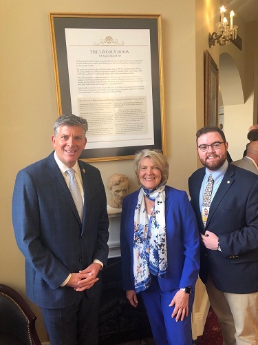 Rep. Darin LaHood, USCHS President Jane L. Campbell, and Samuel Holliday