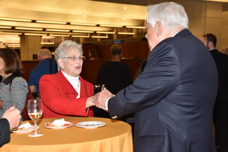 USCHS Trustee Rep. Virginia Foxx greets Society Volunteer John Cox