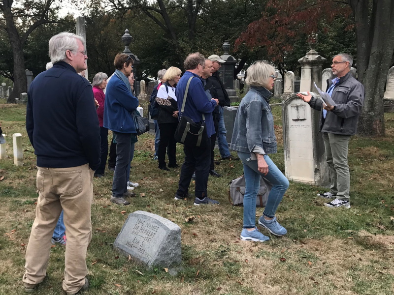 USCHS 2019 Congressional Cemetery Tour: Mr. diGiacomantonio highlights the book carved into a headstone