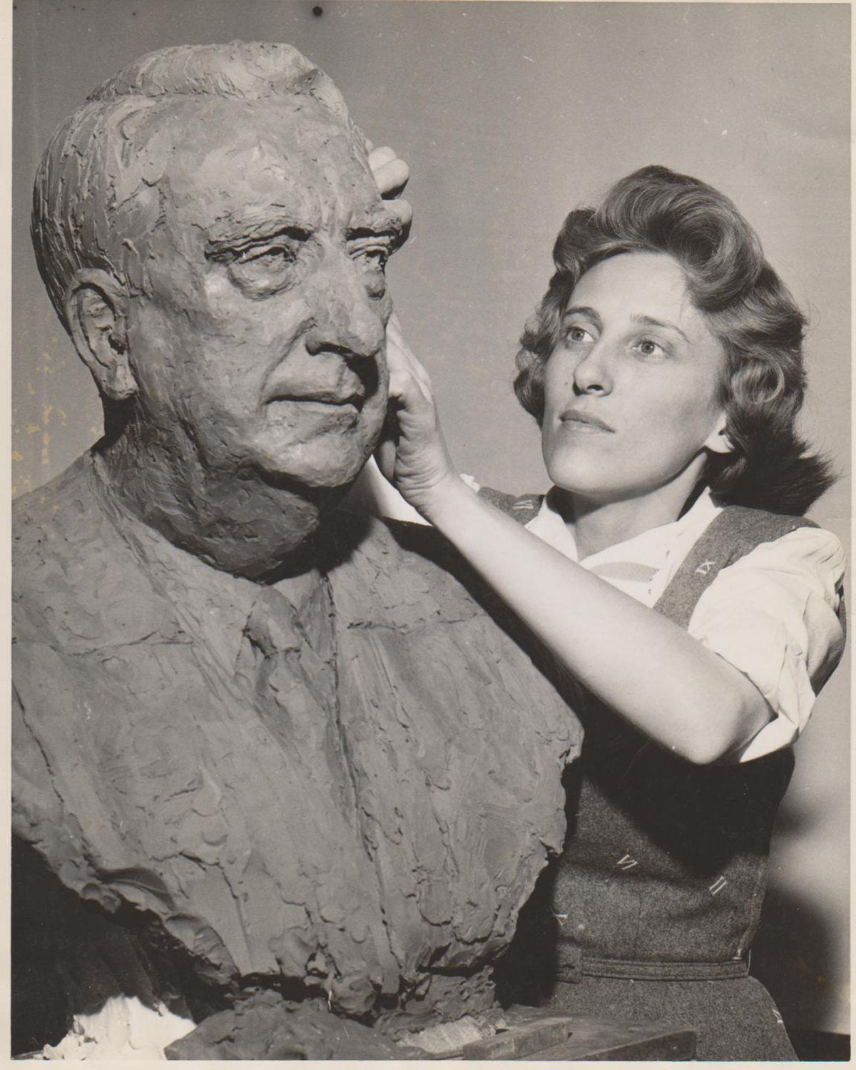 Jimilu Mason working on the bust of U.S. Chief Justice Frederick M. Vinson